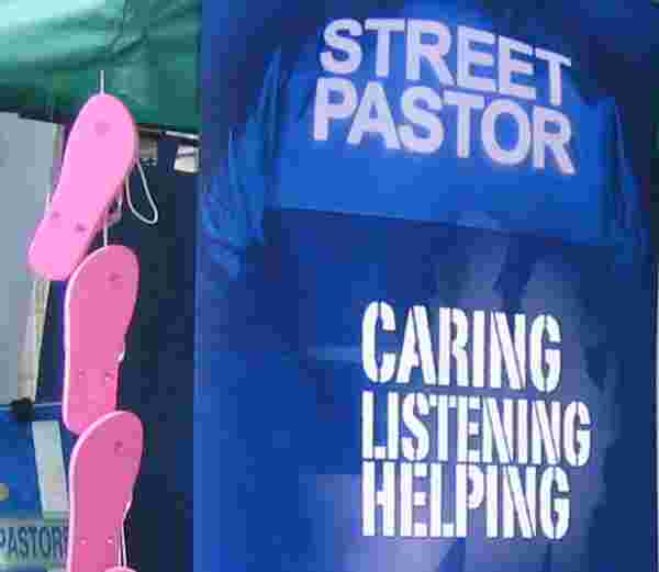 Street pastor banner with pink flip flops